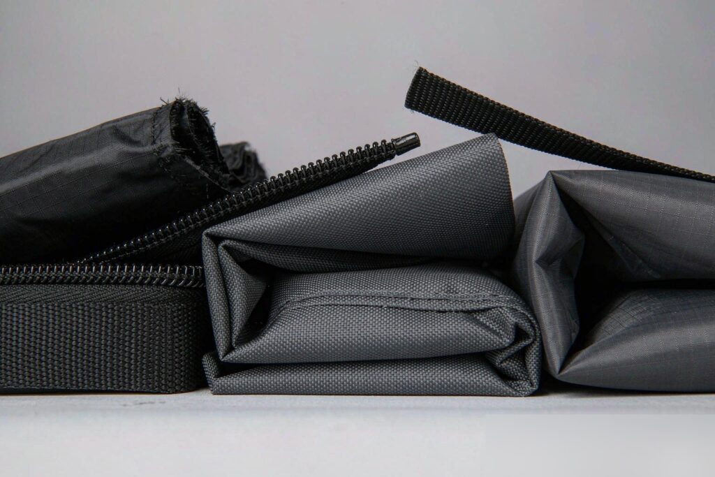 Technical bag fabrics: ripstop nylon, 600D oxford and polyester with YKK zipper