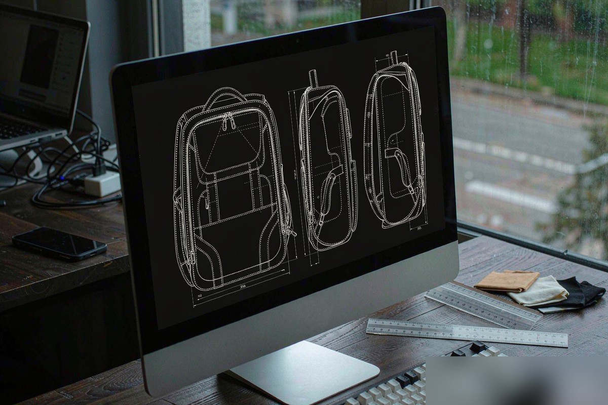 Backpack CAD pattern drawing on a designer monitor in the Kovoeky sampling room